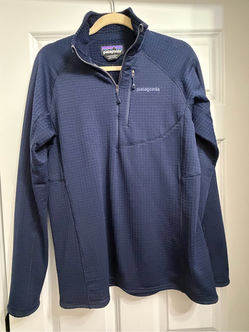 Patagonia women’s 1/4 zip long sleeve top with Polartec Size L